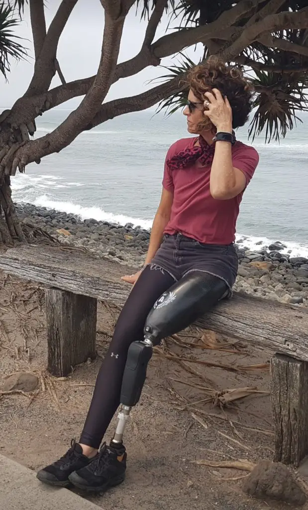 Anita sitting beachside