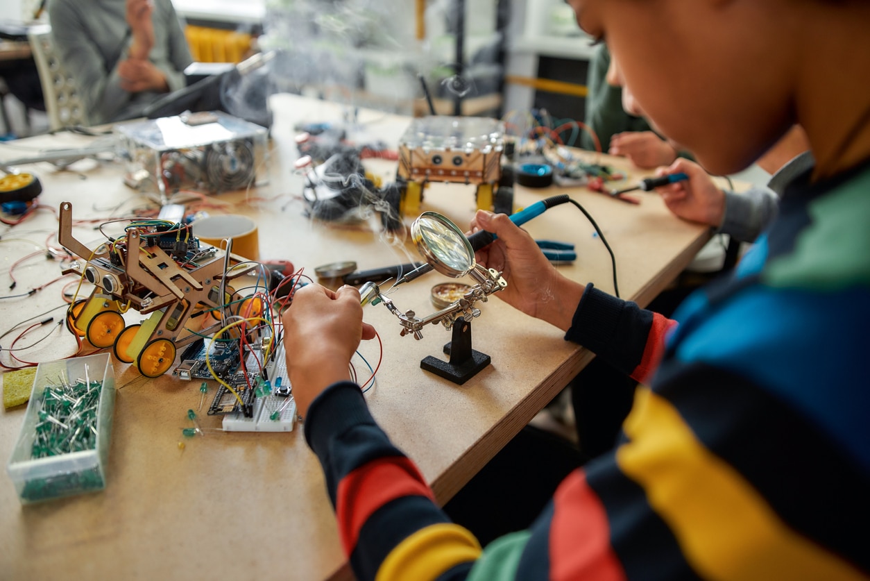 youth working on robotics