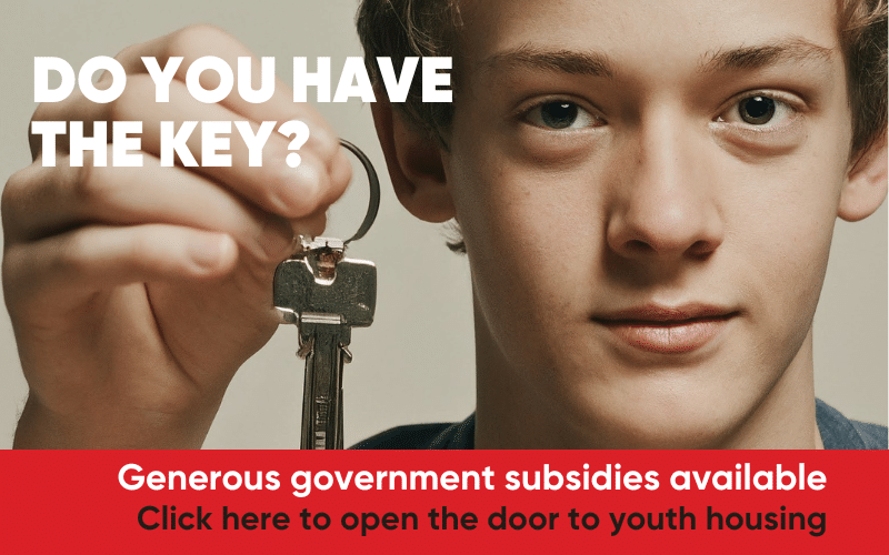 A teen boy holding up a key. Text  reads: do you have the key to youth housing?