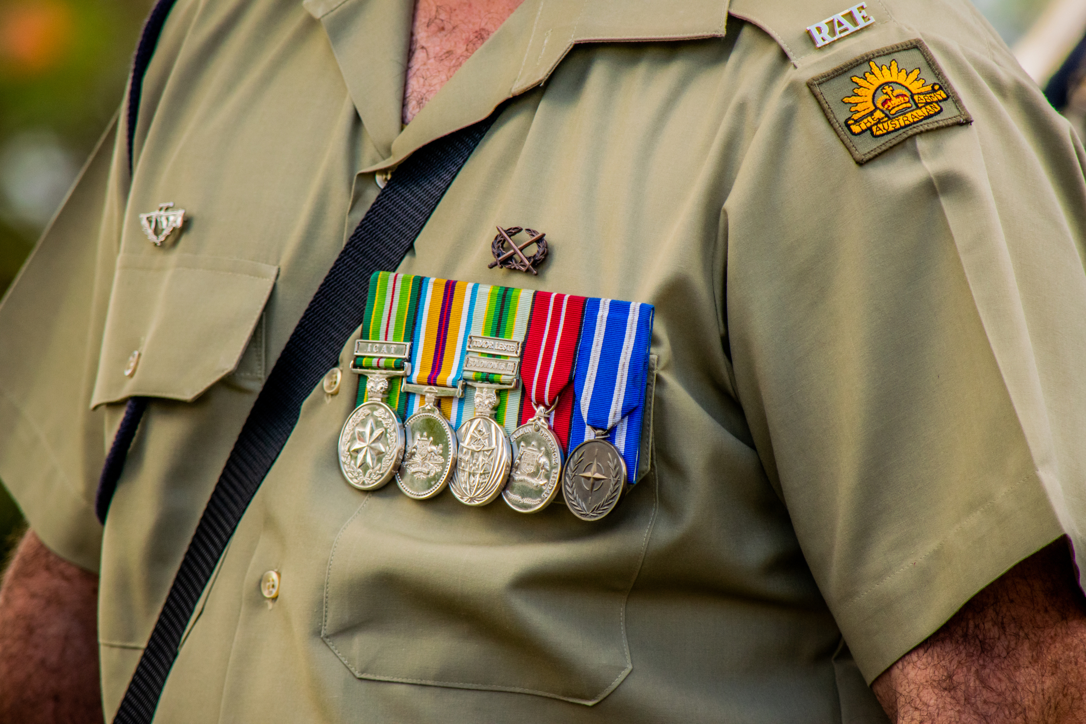 Horizontal Close Up Of Australian Army Soldier's Chest Showing Details Of Uniform, Badges And Medals During The Anzac Day Service In Cooroy, Near Noosa In Queensland