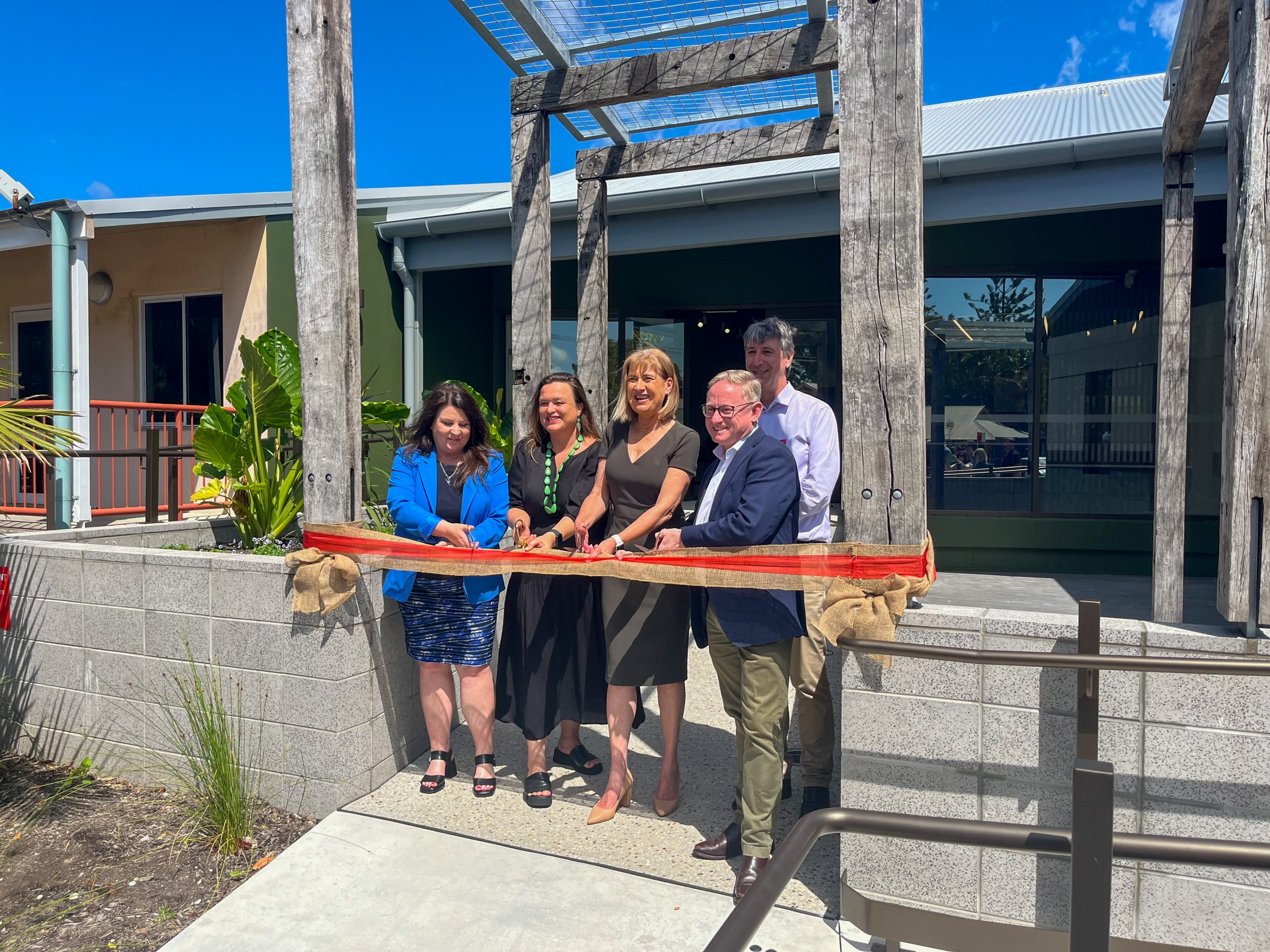 Hon Justine Elliot MP, Tamara Smith MP, Sarah Ndiaye - Mayor of Byron Shire, The Hon. Ben Franklin, MLC, and Social Futures CEO Tony Davies cutting the ribbon to launch Byron CoLab on Arakwal Country