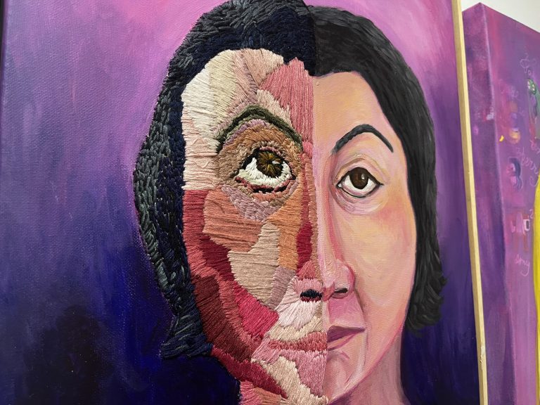 Maree Nicholls of Kookaburra Art Studio Embroidery and painted self portrait of brunette woman