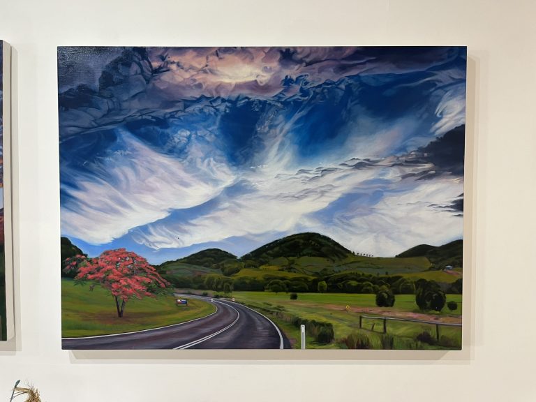 Sandra Guy green cauldron Murwillumbah painting with flowering pink tree