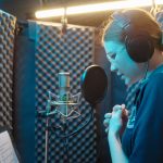 student recording a song