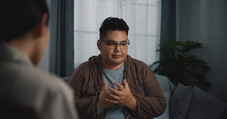 Asian Man Discusses Struggles During Counseling