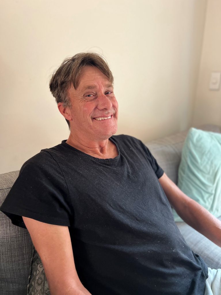 A photo of Stephan smiling at the camera