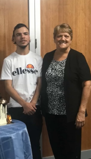 Jesse and Jeanette stand next to each other on Jesses Birthday 