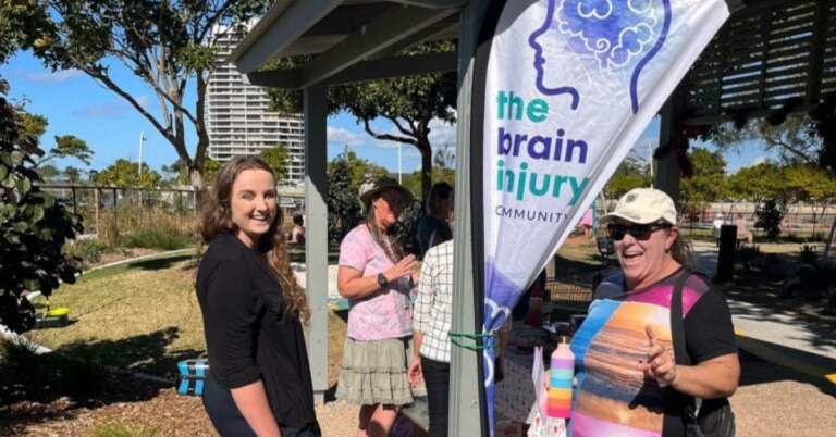 Members of the brain injury community group smiling