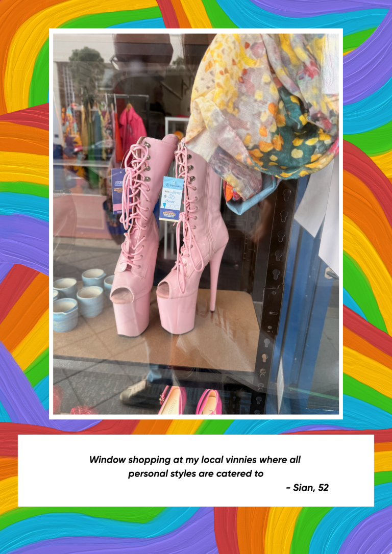 A pair of pink high heel boots in an op shop window